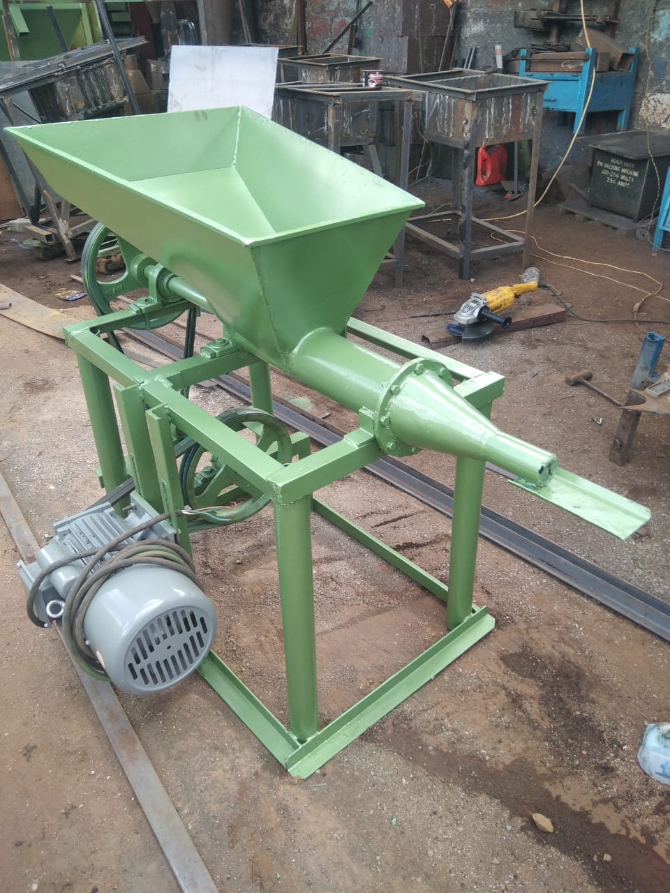 Charcoal briquette machine